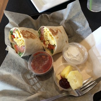 Grind Cafe - The breakfast burrito with salsa and sour cream.  Along with fresh fruit - Coffee & Tea Near Me - Morganton, North Carolina