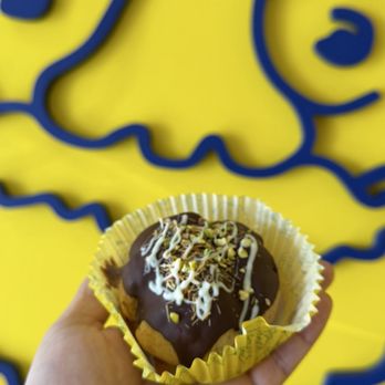 Beard Papa's - Dubai Chocolate Puff (chocolate custard filling with pistachio nuts, baked shredded kataifi, white chocolate drizzle) - Desserts Near Me - Los Angeles, California Beard Papa's - Dubai Chocolate Puff (chocolate custard filling with pistachio nuts, baked shredded kataifi, white chocolate drizzle) - Desserts Near Me - Los Angeles, California