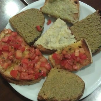 Pomoré - Mix di bruschette..pomodorini, carciofi e olive verdi - Pizza Near Me - Rome, RM Pomoré - Mix di bruschette..pomodorini, carciofi e olive verdi - Pizza Near Me - Rome, RM