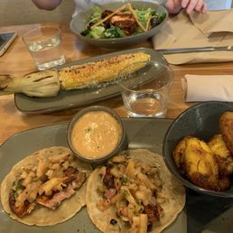 Shrimp tacos, roasted sweet plantains (AMAZING) and delicious sauces! Shrimp tacos, roasted sweet plantains (AMAZING) and delicious sauces!