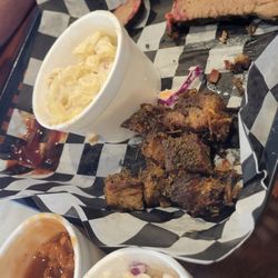 Lynnville's Smokin' J's BBQ - Burnt ends and brisket. Cole slaw, baked beans, and bacon mac 'n cheese. Sorry it's half eaten. Forgot to take the picture earlier.