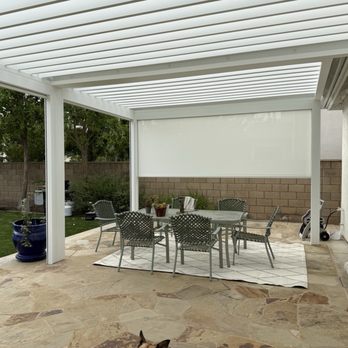 IStructure USA - Inside view of shade half down and view of flagstone - Patio Coverings Near Me - Irvine, California