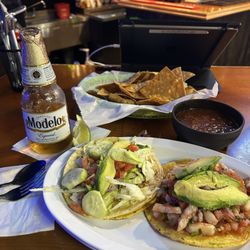 E11even Bar and Grill - Grilled fish taco on corn and their salsa shrimp ceviche tostada. Both fantastic