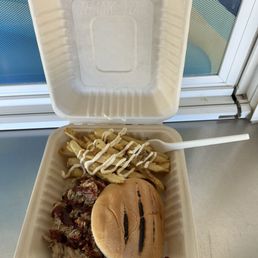 Pulled pork sandwich with garlic fries Pulled pork sandwich with garlic fries