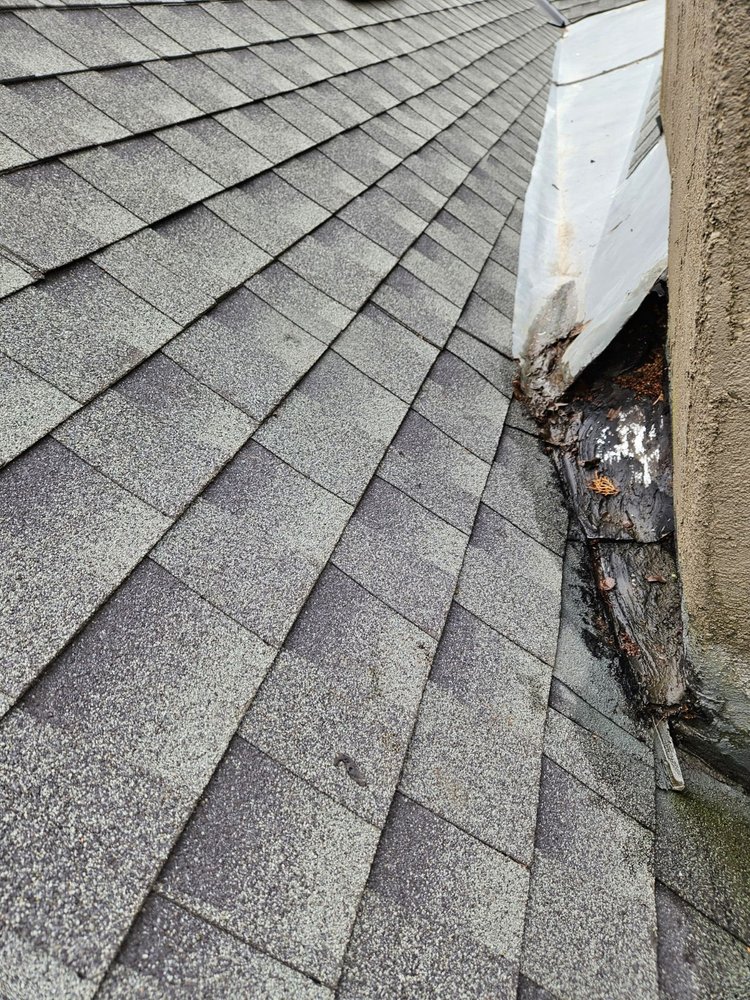 Slide of Green's Roofing