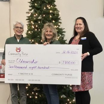 Elderwerks - Deana Liss, ED, accepting a generous donation from Community Purse of McHenry County - Community Service/Non-Profit Near Me - Palatine, Illinois