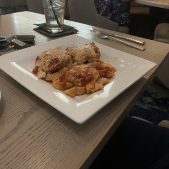 The Sacred Pepper - Trenne Chicken Parmesan made with grilled chicken - New American Near Me - Tampa, Florida The Sacred Pepper - Trenne Chicken Parmesan made with grilled chicken - New American Near Me - Tampa, Florida