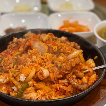 Hahm Ji Bach - a skillet of food on a table - Korean Near Me - Flushing, New York Hahm Ji Bach - a skillet of food on a table - Korean Near Me - Flushing, New York