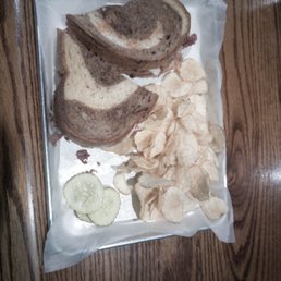 Reuben with chips and pickles