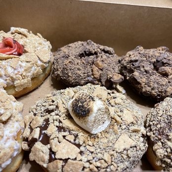 Hurts Donut - Chocolate S'more's, Chocolate Peanut Butter and Graham Cracker Rolls! - Donuts Near Me - West Des Moines, Iowa Hurts Donut - Chocolate S'more's, Chocolate Peanut Butter and Graham Cracker Rolls! - Donuts Near Me - West Des Moines, Iowa