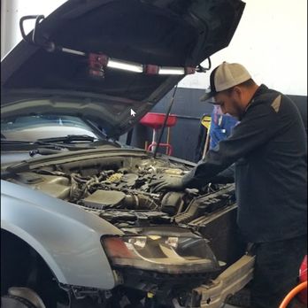 J&C Auto Repair - Working on a customer's vehicle. - Auto Repair Near Me - San Jose, California J&C Auto Repair - Working on a customer's vehicle. - Auto Repair Near Me - San Jose, California