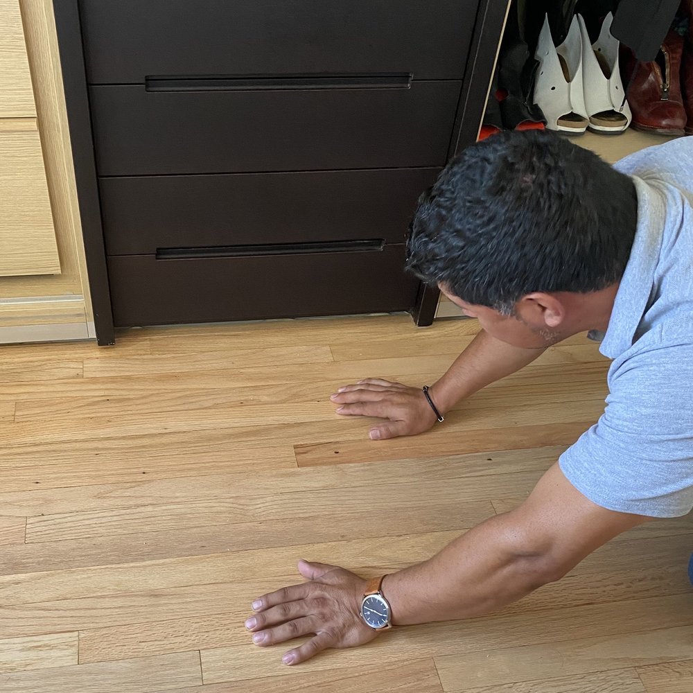Yeshua Flooring - ESVIN examining water damage on my floor. YESHUA flooring ready to fix the problem! - Refinishing Services Near Me Yeshua Flooring - ESVIN examining water damage on my floor. YESHUA flooring ready to fix the problem! - Refinishing Services Near Me