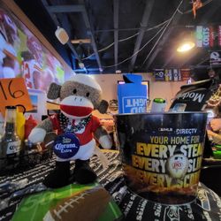 The Plate Bar and Grill - Football Monkey waiting for his bowl of food during their  off the Super Game event