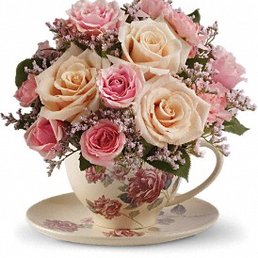 Victorian Tea Cup Bouquet I ordered off Hearts and Flowers web site. I count 8-10 roses in this pic.