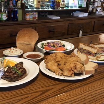 St Joe Inn - plates of food on a bar counter - Bars Near Me - Evansville, Indiana St Joe Inn - plates of food on a bar counter - Bars Near Me - Evansville, Indiana