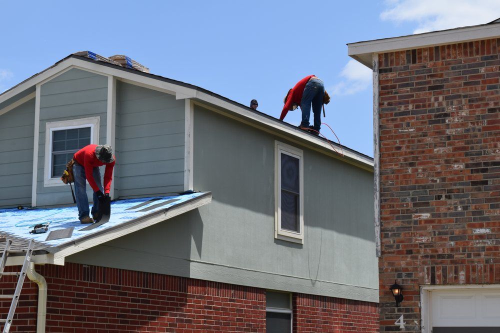 Slide of Top Notch Roofing
