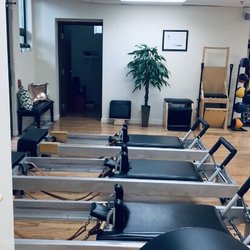 Bare Fitness - Pilates Reformers and chairs