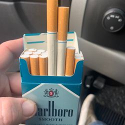 Tango Beer And Wine Store - This guy sold me cigarettes that are over 6 months old. And yellow. And refused to refund my $8.75.