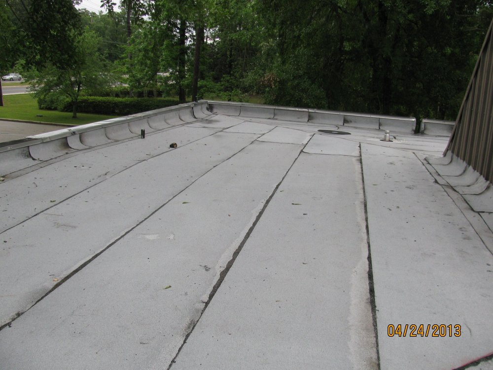 Slide of Magnolia Roofing