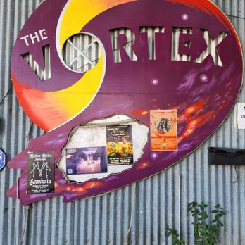The Vortex - a colorful sign on the side of a building - Performing Arts Near Me - Austin, Texas