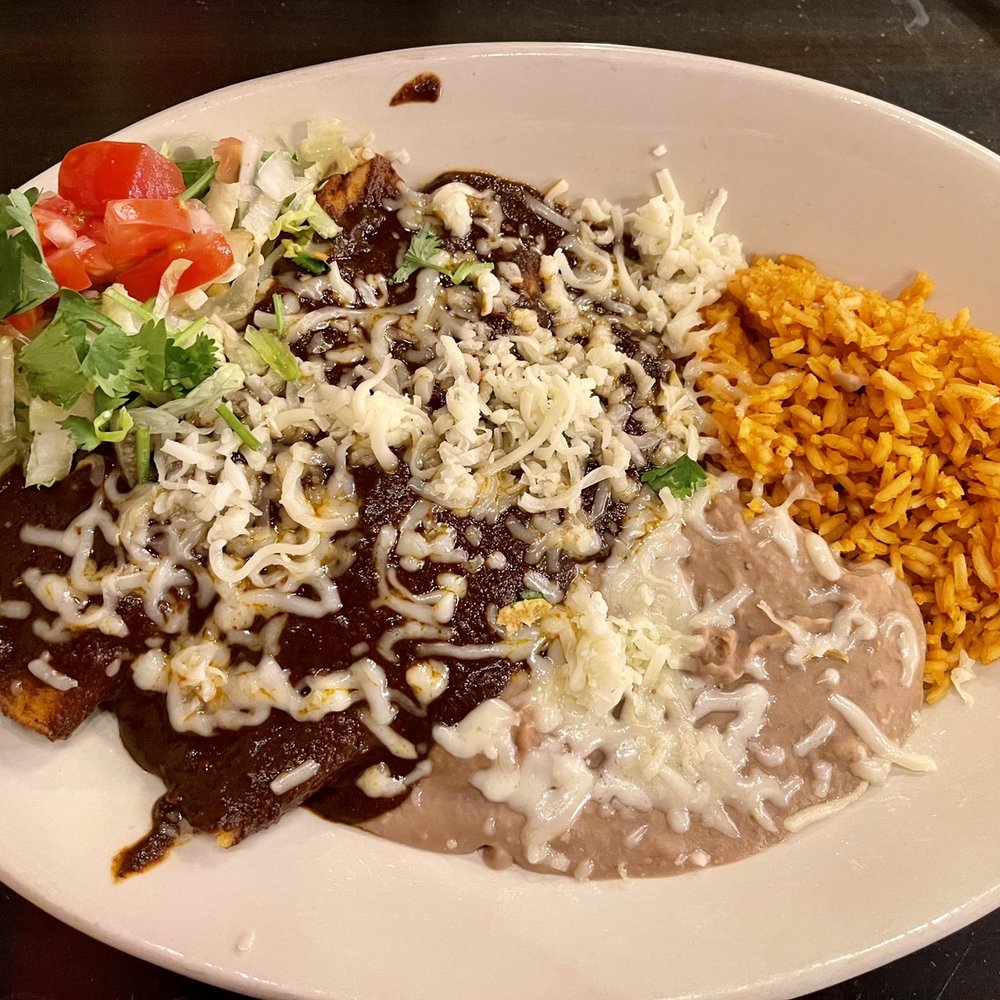Mi Corazon Mexican Restaurant - Chicken enchiladas smothered in rich flavorful mole with rice and refried beans - Mexican Near Me - Spanish Fork, Utah Mi Corazon Mexican Restaurant - Chicken enchiladas smothered in rich flavorful mole with rice and refried beans - Mexican Near Me - Spanish Fork, Utah
