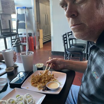 Rock N Roll Sushi - His "picture" face - Sushi Bars Near Me - Huntsville, Alabama