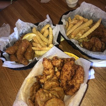 Spanky's Beachside - Chicken Fingers + Spuds (Yellow Basket) Grouper Fingers + Fries (Black Baskets) - Seafood Near Me - Tybee Island, Georgia Spanky's Beachside - Chicken Fingers + Spuds (Yellow Basket) Grouper Fingers + Fries (Black Baskets) - Seafood Near Me - Tybee Island, Georgia