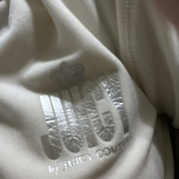 Juicy Couture sweatsuit. Got it for $17 in pristine condition.