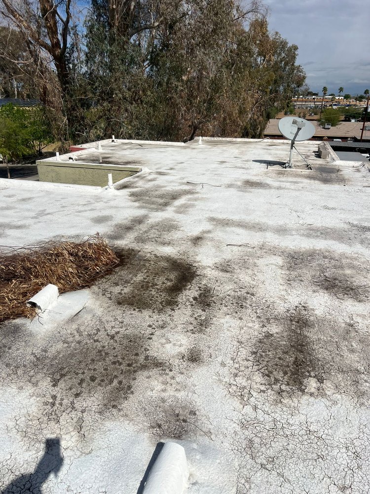 Slide of Avis Roofing Service