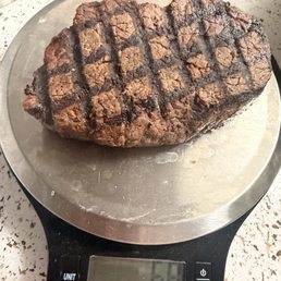 An 11 oz steak weighing in at 6.8