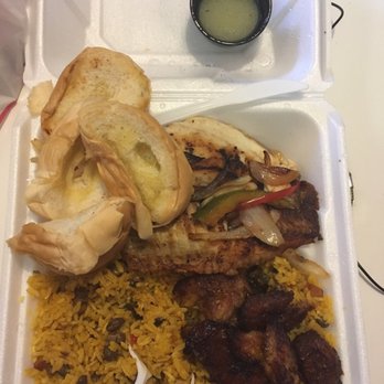 El Bajareque Restaurant - Tilapia, pigeon peas and rice, sweet plantains, rice had crunchy uncooked grains. - Latin American Near Me - Miami, Florida