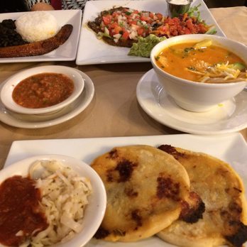 Mojito Cafe & Lounge - Bandeja salvadoreña (back right), tortilla soup (right), puposas with relish ( front) - Latin American Near Me - Port Washington, New York Mojito Cafe & Lounge - Bandeja salvadoreña (back right), tortilla soup (right), puposas with relish ( front) - Latin American Near Me - Port Washington, New York