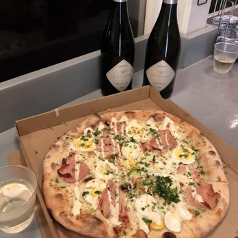 De Pizzabakkers - White truffle pizza with egg and ham and bottles of Prosecco - Pizza Near Me - Amsterdam, New Hampshire De Pizzabakkers - White truffle pizza with egg and ham and bottles of Prosecco - Pizza Near Me - Amsterdam, New Hampshire