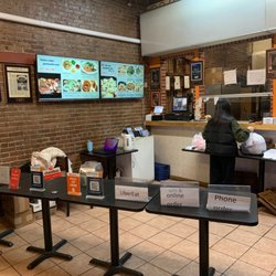 Gene's Chinese Flatbread Cafe - Front counter. Mainly for to go orders but window bar seating for 5 people and a table for 3