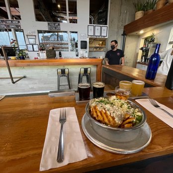 Aslan Depot - a plate of food on a table - Breweries Near Me - Bellingham, Washington