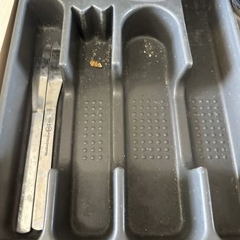 Delight's Hot Springs - Food crumbs in the silverware holder. - Resorts Near Me - Tecopa, California Delight's Hot Springs - Food crumbs in the silverware holder. - Resorts Near Me - Tecopa, California