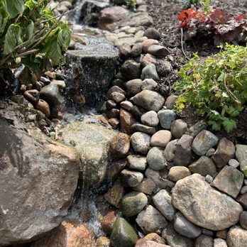 Williamson’s Water and Woods - a stream running between rocks - Home Services Near Me Williamson’s Water and Woods - a stream running between rocks - Home Services Near Me