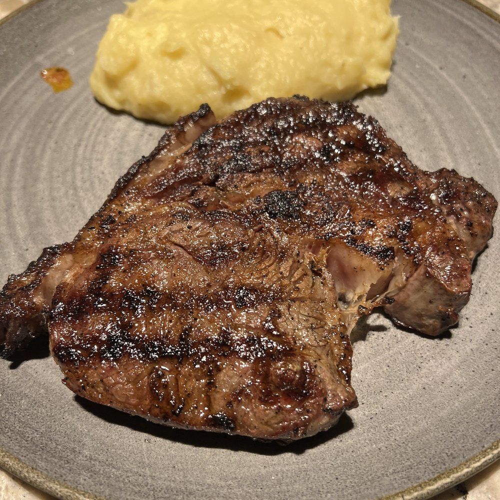 Firebirds Wood Fired Grill - Aged rib eye and Parmesan mashed potatoes - Seafood Near Me - Frederick, Maryland Firebirds Wood Fired Grill - Aged rib eye and Parmesan mashed potatoes - Seafood Near Me - Frederick, Maryland