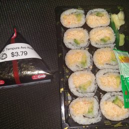 Sushi and onigiri of shrimp tempura with Avocado. Both hit the spot.
