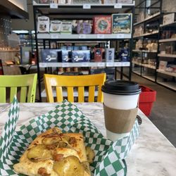 Forno West - Potato pizza and tea with their store in the background
