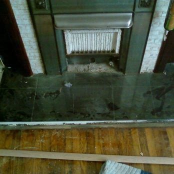Mathiesen Floors - a fireplace in a house - Flooring Near Me - High Ridge, Missouri