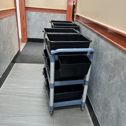 Dish bins left in hallway