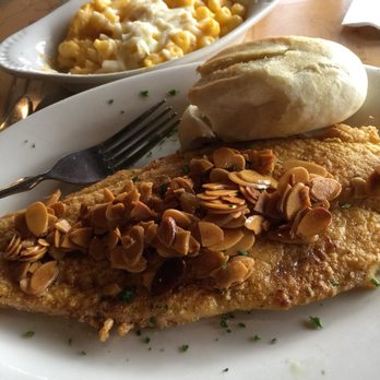 Felix's Fish Camp - White fish almandine with a side of macaroni and cheese. - Seafood Near Me - Spanish Fort, Alabama Felix's Fish Camp - White fish almandine with a side of macaroni and cheese. - Seafood Near Me - Spanish Fort, Alabama