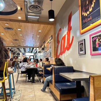 Raising Cane's Chicken Fingers - Interior - Chicken Shop Near Me - Davis, California Raising Cane's Chicken Fingers - Interior - Chicken Shop Near Me - Davis, California