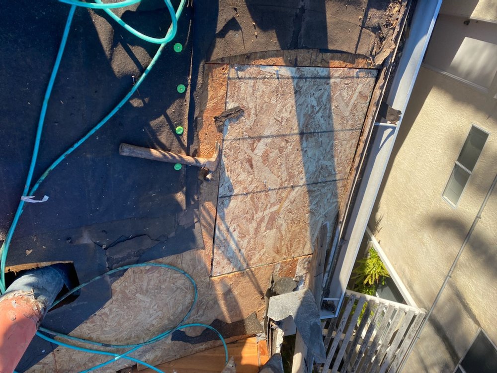 Slide of TWM Roofing