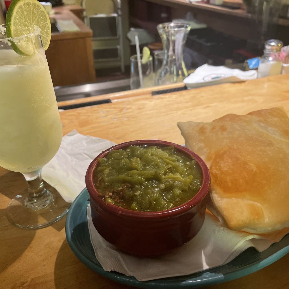 Tomasita's - Green Chile soup or stew with ground beef with sopapilla and frozen house margarita - New Mexican Cuisine Near Me - Santa Fe, New Mexico Tomasita's - Green Chile soup or stew with ground beef with sopapilla and frozen house margarita - New Mexican Cuisine Near Me - Santa Fe, New Mexico