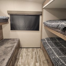 Moderie RV Rental - Four beds in the rear bedroom are a bonus for a family, or camping with friends. The top right bunk folds up.