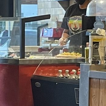 Blaze Pizza - This worker fly away hairs and she's not wearing a hat - Salad Near Me - Alhambra, California