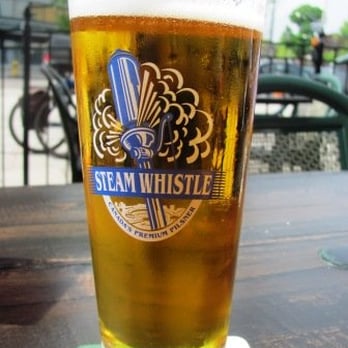 Bryden's - a pint of beer on a coaster - Pubs Near Me - Toronto, Ontario