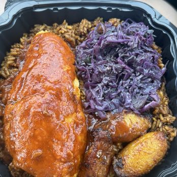 Fork in Nigeria - Red Snapper on Rice - African Near Me - Detroit, Michigan